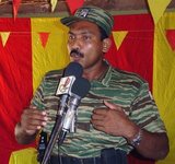 V. Balakumaran used to be one of the two senior leaders of the Eelam Revolutionary Organisation of Students (EROS). In 1990 he and a large portion of EROS members left the organization and joined the Liberation Tigers of Tamil Eelam (LTTE). He was active in LTTE's political division. On January 29, 2009, during the last phase of the Sri Lanka Civil War, Balakumaran was seriously wounded in an assault by soldiers of the Sri Lanka army. He was captured during the last hours of the civil war and held under the Prevention of Terrorism act by the Sri Lanka authorities.