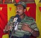 Sri Lanka: Senior LTTE Cadre K. V. Balakumaran addressing a Tamil Tiger meeting c.2008. Photo by LTTE (CC BY-SA 3.0 License)