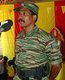 Sri Lanka: Senior LTTE Cadre Commander Colonel Ramesh addressing a Tamil Tiger gathering c.2008. Photo by LTTE (CC BY-SA 3.0 License)