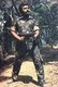Sri Lanka: LTTE Comander Velupillai Prabhakaran posing with a machine gun somewhere in the Wanni, northern Sri Lanka, c.1985. Photo by LTTE (CC BY-SA 3.0 License)